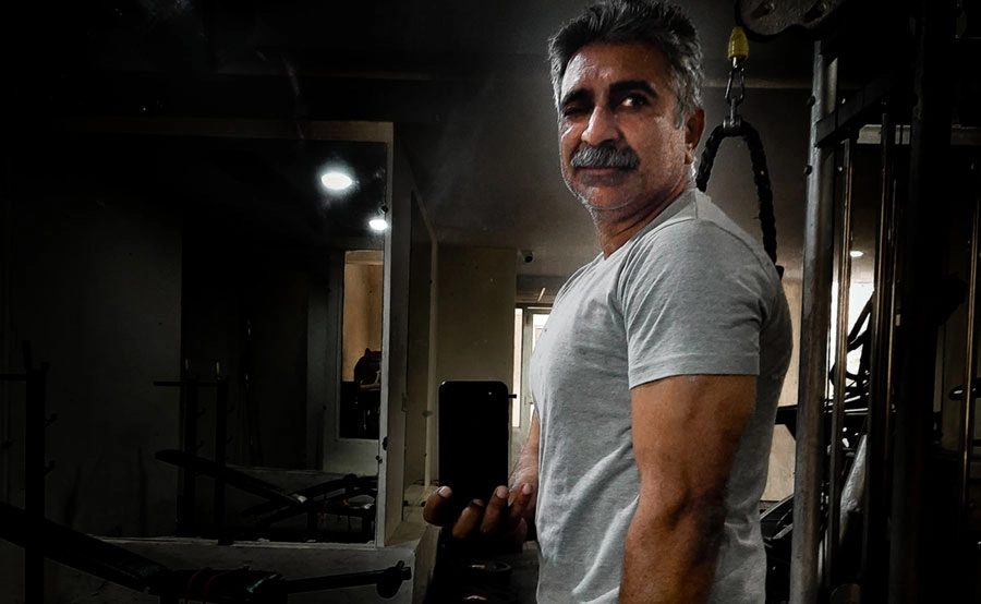 Photo of a 50 plus man after weight training